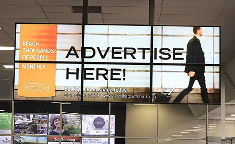 Video wall display that reads "Advertise Here!"